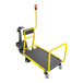 An Amigo Dex Pro+ motorized carrier with yellow handles and a detachable trailer.