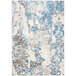An Abani Arto teal and beige area rug with abstract blue and white designs.