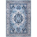 An Abani Molana Collection beige rug with blue and white traditional medallion designs.
