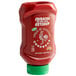 A red plastic bottle of Huy Fong Sriracha Hot Chili Ketchup with a label.