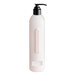 A white PAYA DoveLok shampoo bottle with a black dispenser.