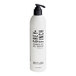 A white Grey + Finch DoveLok bottle of shower gel with black text and a black dispenser.