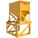A yellow Jescraft forklift concrete beam bucket with a chain on a stand.