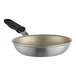 A Vollrath Wear-Ever aluminum non-stick fry pan with a black silicone handle.