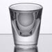 A clear Libbey shot glass with a small bottom.