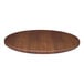 A Perfect Tables 48" round dark walnut woodgrain table top.