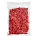 A clear plastic bag of red Sevillo Sundried Julienne Tomato Strips.