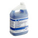 A blue and white jug of Dawn Professional scrubbing liquid.