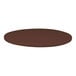 A close up of a Perfect Tables 24" outdoor round brown table top.