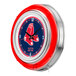 A Holland Bar Stool Boston Red Sox neon clock with a red and blue logo and numbers on a red and blue face.