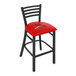 A Holland Bar Stool St. Louis Cardinals bar stool with a red padded seat and ladder back.