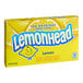 A yellow Lemonhead candy box.
