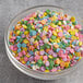 A bowl of Pastel Confetti Sequin Sprinkles.