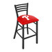 A Holland Bar Stool Philadelphia Phillies bar stool with a red padded seat with the team's logo.