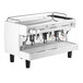 A white Gaggia Vetro espresso machine with three coffee machines.