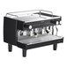 A black and silver Gaggia Vetro 2 Group Automatic Espresso Machine on a deli counter.