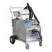 A Goodway heavy duty dry steam cleaner on wheels with twin boilers and a white container.