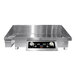 A stainless steel Spring USA countertop griddle attachment with knobs.