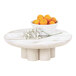 A Cal-Mil Newport white-washed pine wood display riser with a bowl of oranges and flowers.
