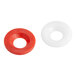 Two white and red rubber washers with a hole in the middle.