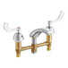 A Chicago Faucets deck-mounted faucet with handles and a chrome finish.
