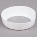 A white circular Tablecraft plastic dispenser collar with a hole in the middle.