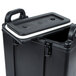 A black plastic lid for a Cambro container.