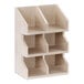 A white-washed pine wood Cal-Mil condiment organizer with three shelves.
