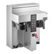 A Fetco CBS-1232 Plus Series automatic digital coffee brewer with a screen and buttons.