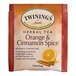 A box of Twinings Orange & Cinnamon Spice Herbal Tea Bags with orange and cinnamon on the package.