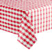 A table with a red and white checkered Hoffmaster table cover.
