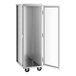 A Regency stainless steel sheet pan rack with a clear acrylic door open.