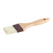 A Vollrath boar bristle pastry brush with a wooden handle.