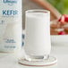 A close up of a bottle of Lifeway Low-Fat Plain Kefir on a white background.