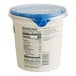 A Chobani Non-Fat Plain Greek Yogurt container with a blue lid.