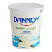 A white container of Dannon Low-Fat Vanilla Yogurt with blue and white text.