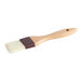 A Vollrath Boar Bristle Pastry Brush with a wooden handle.