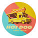 A white vinyl label with a yellow food truck and hot dog on top.