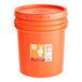 An orange Date Lady bucket with a lid.