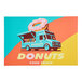 A white rectangular vinyl sticker with a blue food truck and pink donut with sprinkles and the words "Donut Truck" on it.