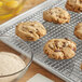 A tray of cookies on a Date Lady Organic Date Sugar cooling rack.