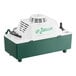 A white Zoeller condensate pump with green accents.