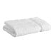 A folded white Lavex Premium bath towel.
