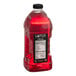 A bottle of Lotus Plant Energy Skinny Pink Lotus 5:1 energy concentrate, a red liquid.