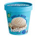 A scoop of Eclipse Foods vegan vanilla ice cream in a blue container.