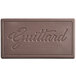 A brown rectangular Guittard chocolate bar with the word "Guittard" on it.