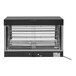 A black and silver Vollrath hot food merchandiser with a metal rack.