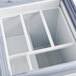 An Avantco gelato dipping cabinet with open compartments.