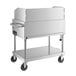 A large stainless steel cart with wheels.