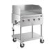 A Backyard Pro stainless steel gas grill on a cart with wheels.
